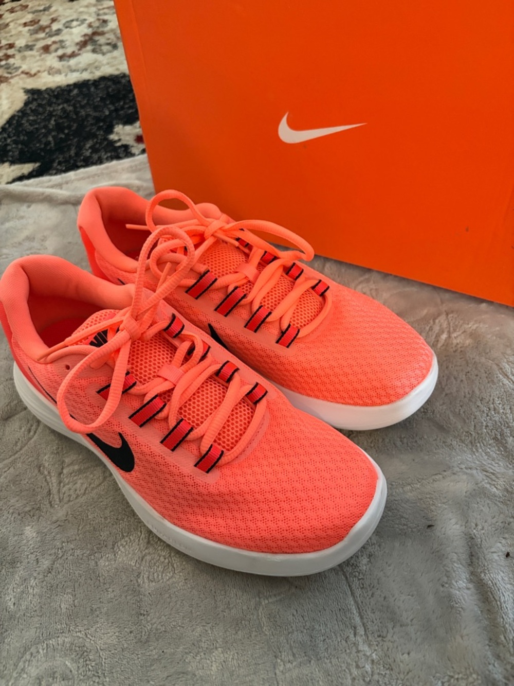 Nike Coral Pink Mesh Athletic Sneakers with Black Swoosh